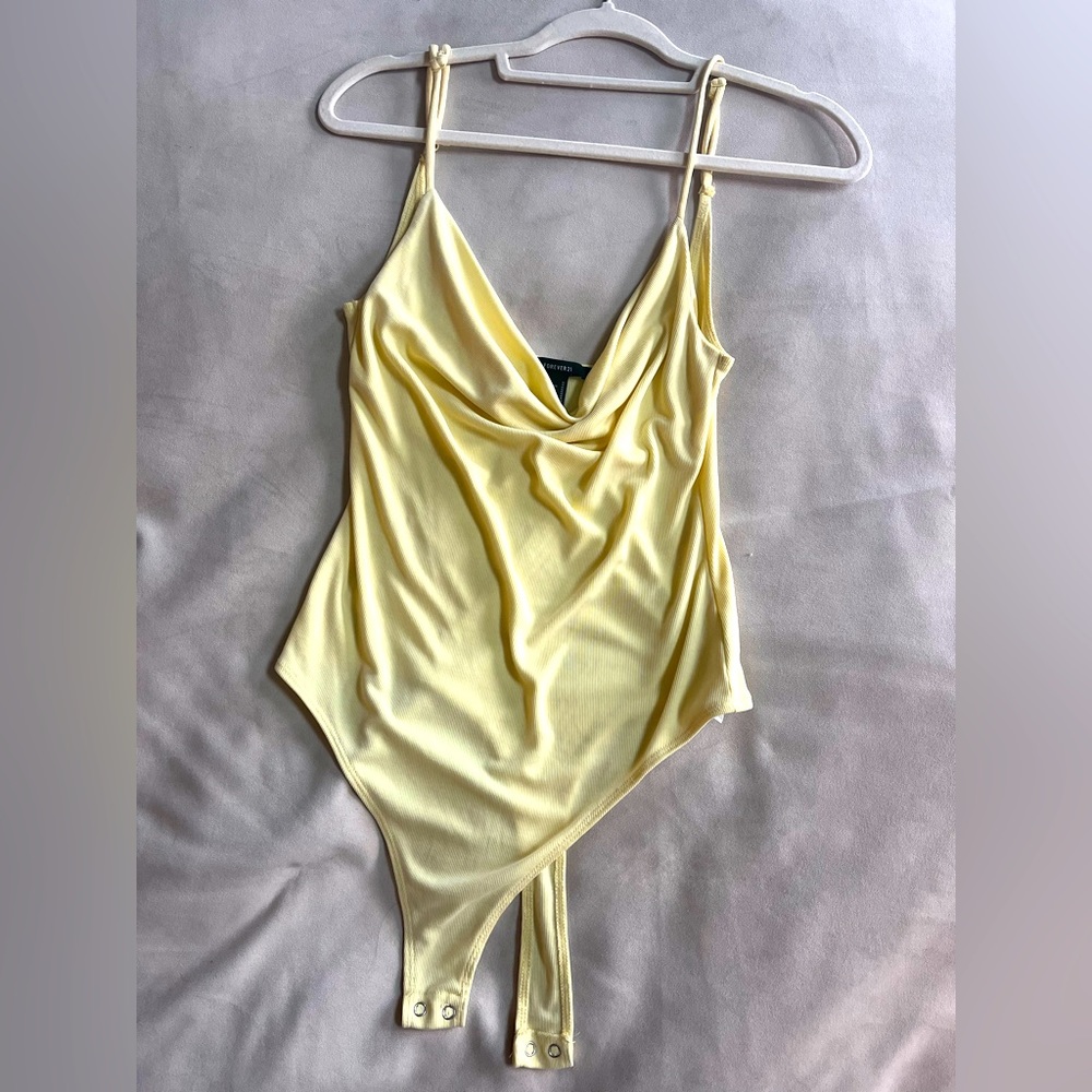 Yellow bodysuit